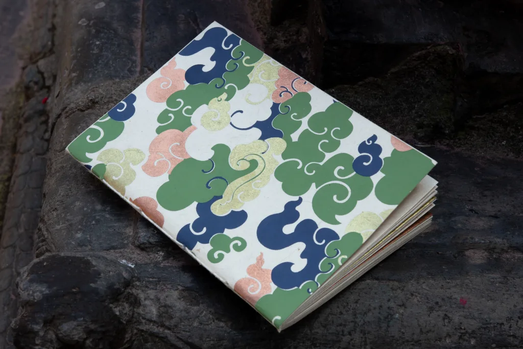 Clouds under rooftop of the world notebook
